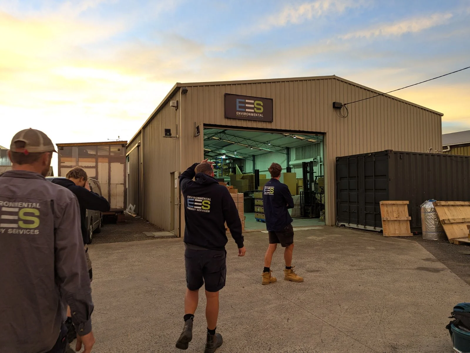 EES team walking into warehouse at sunset, Moolap Geelong