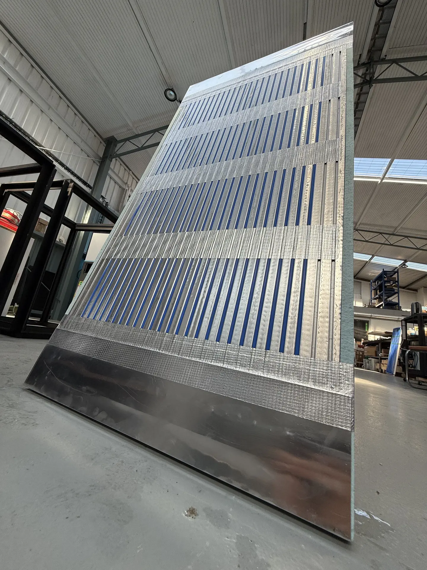 Angled view of the completed panel showing tube density and insulation edge detail